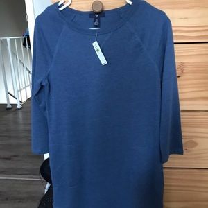 Gap women’s sweater dress, color is blue.